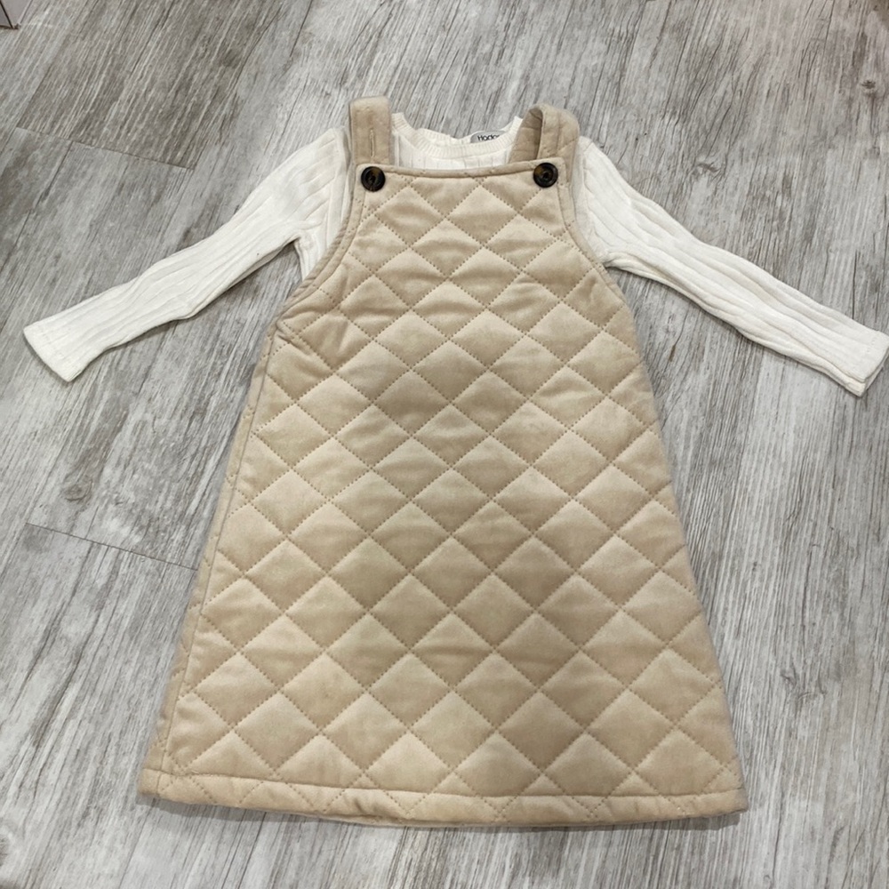 Hadas. Jumper is size 3. Shirt is 18/24 months.